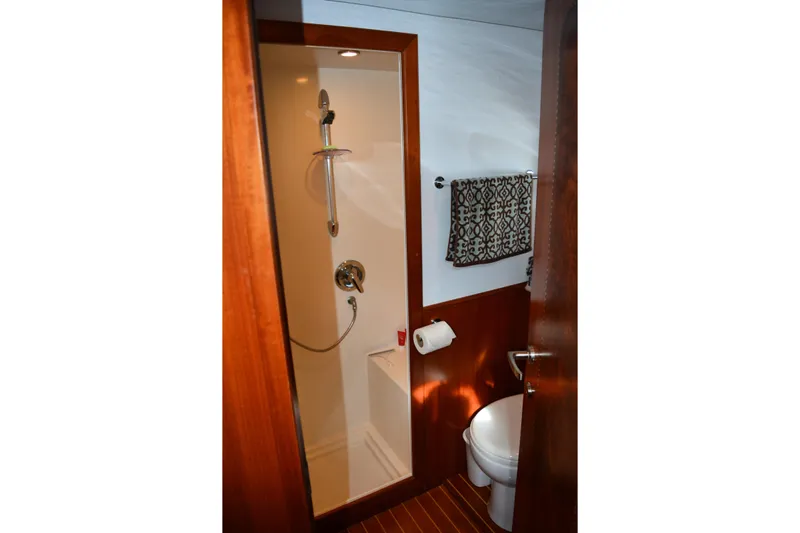 Wandra Yacht Photos Pics Bathroom interior of 2008 Novatec Islander 60 yacht with shower and toilet.