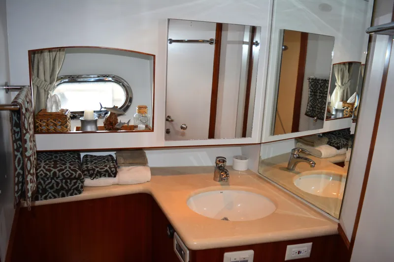 Wandra Yacht Photos Pics Luxurious bathroom in 2008 Novatec Islander 60 yacht with elegant fixtures and decor.