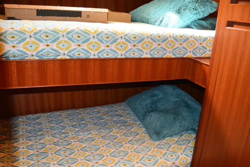 Wandra Yacht Photos Pics Bunk beds with patterned bedding in 2008 Novatec Islander 60 yacht cabin.
