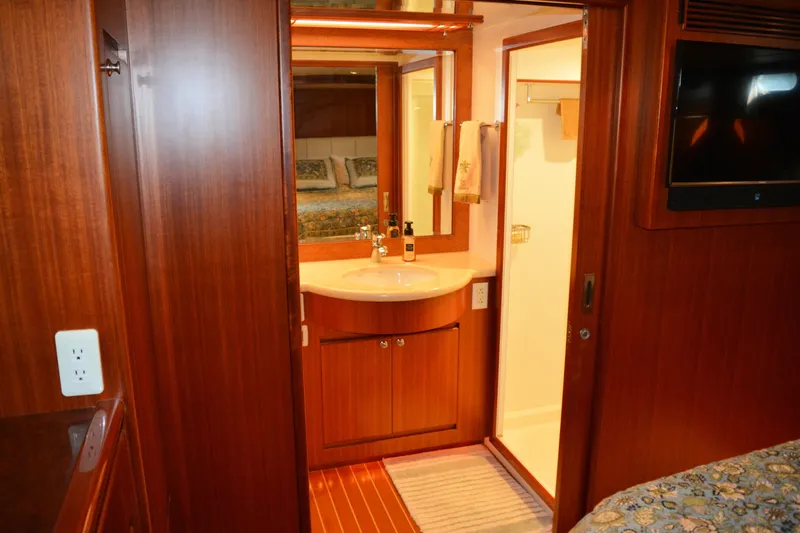 Wandra Yacht Photos Pics Luxurious bathroom interior of 2008 Novatec Islander 60 yacht with wood finish and modern amenities.