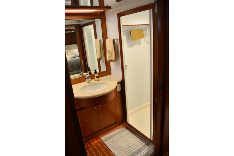 Wandra Yacht Photos Pics Bathroom interior of 2008 Novatec Islander 60 yacht with sink and shower.