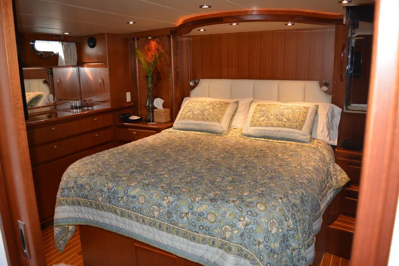 Wandra Yacht Photos Pics Luxurious bedroom interior of 2008 Novatec Islander 60 yacht with elegant wood finish.