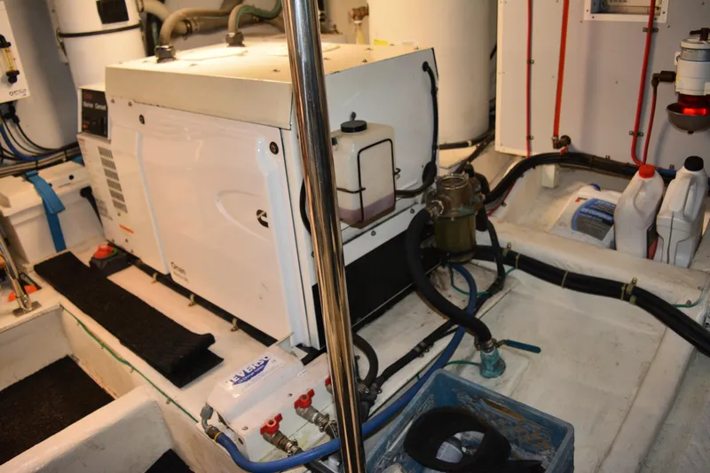 Wandra Yacht Photos Pics Engine room of 2008 Novatec Islander 60 yacht with generator and equipment.