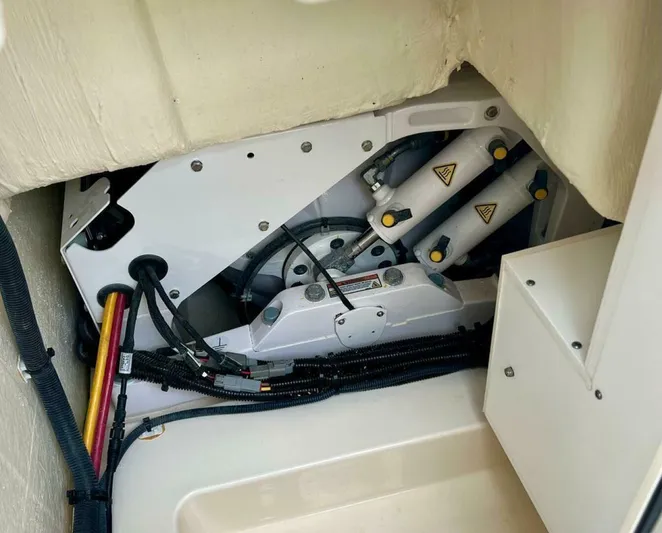  Yacht Photos Pics 2023 Scout 377 LXF boat engine compartment with visible wiring and hydraulic components.