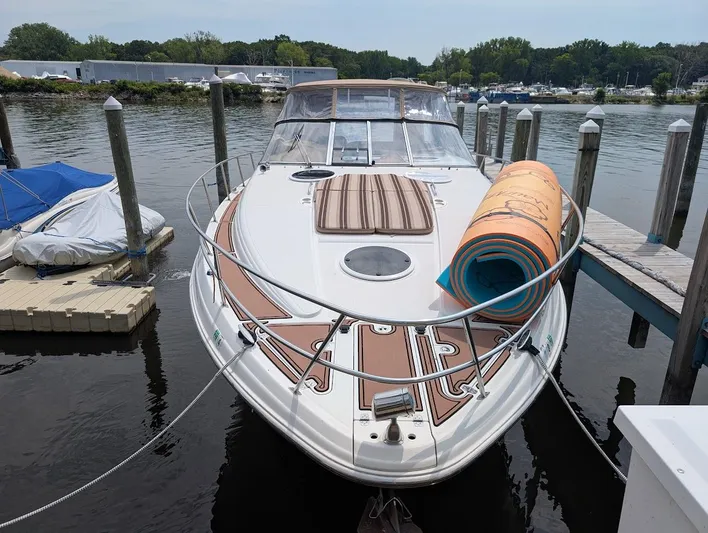 No Drama Yacht Photos Pics 2002 Regal Commodore 3860 yacht docked at marina with rolled-up mat on deck.