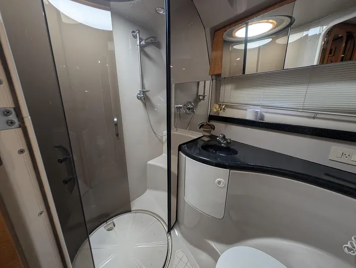 No Drama Yacht Photos Pics Luxurious bathroom in 2002 Regal Commodore 3860 yacht with shower and sleek fixtures.