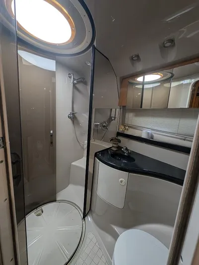 No Drama Yacht Photos Pics Luxurious bathroom in 2002 Regal Commodore 3860 yacht with shower and vanity.