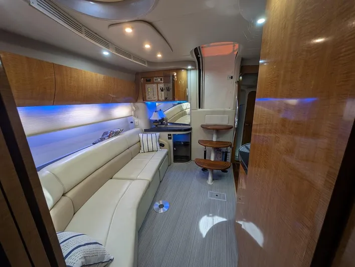 No Drama Yacht Photos Pics Luxurious interior of a 2002 Regal Commodore 3860 yacht with plush seating and modern lighting.