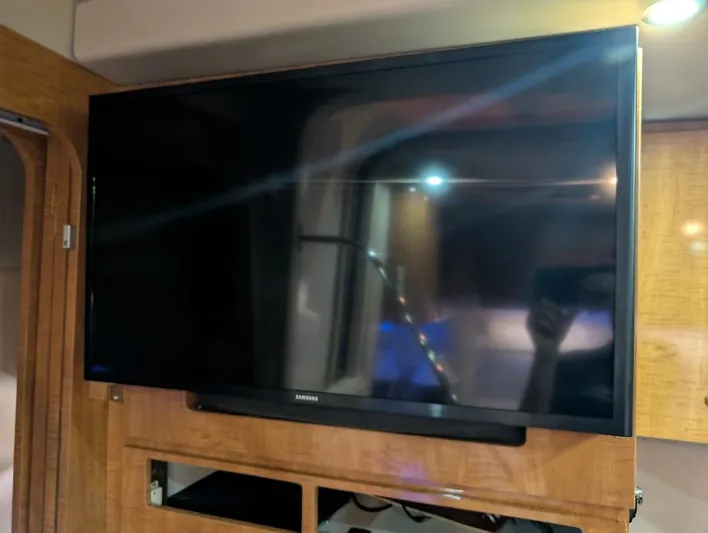 No Drama Yacht Photos Pics Flat-screen TV inside 2002 Regal Commodore 3860 yacht interior.