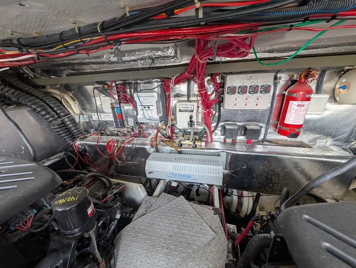 No Drama Yacht Photos Pics Engine room of a 2002 Regal Commodore 3860 with wiring and fire extinguisher.