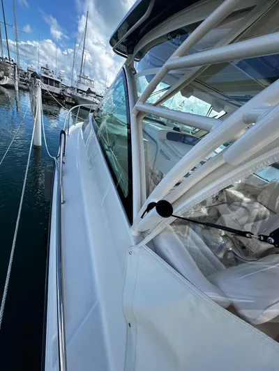  Yacht Photos Pics 2021 Grady-White Express 370 boat docked at marina, side view.