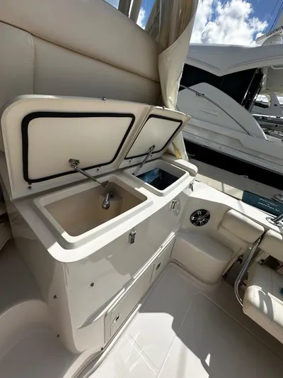  Yacht Photos Pics 2021 Grady-White Express 370 boat interior with open storage compartments.
