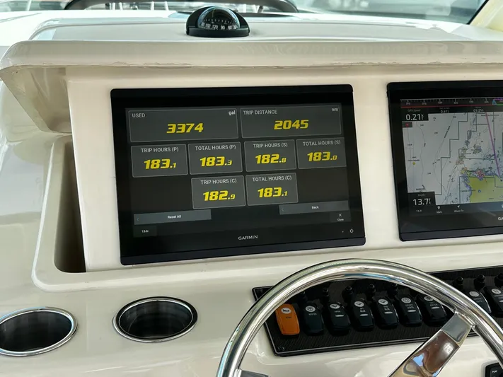  Yacht Photos Pics Dashboard of 2021 Grady-White Express 370 showing trip data and navigation screens.