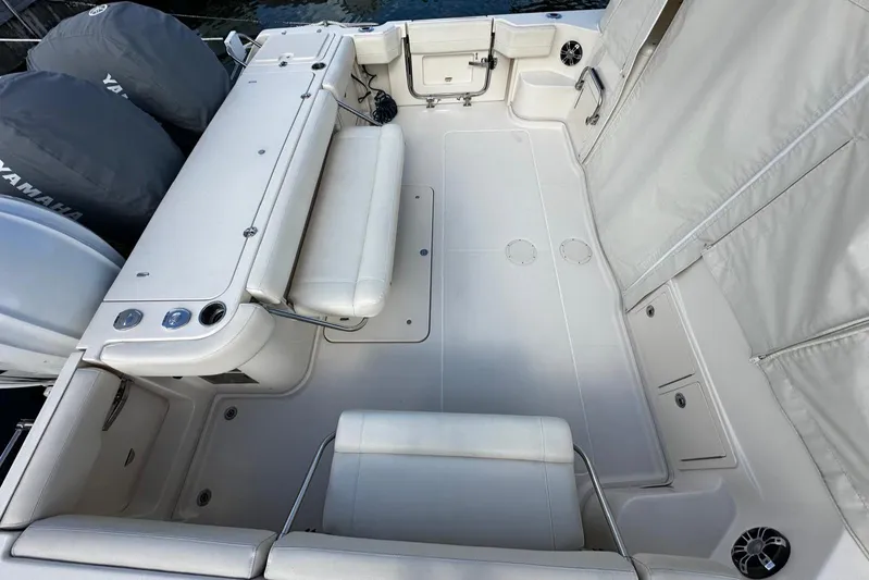  Yacht Photos Pics 2021 Grady-White Express 370 boat interior with seating and Yamaha engines.