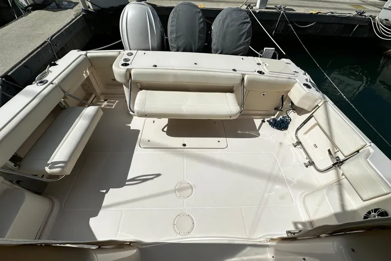  Yacht Photos Pics 2021 Grady-White Express 370 boat interior with spacious seating and clean deck.