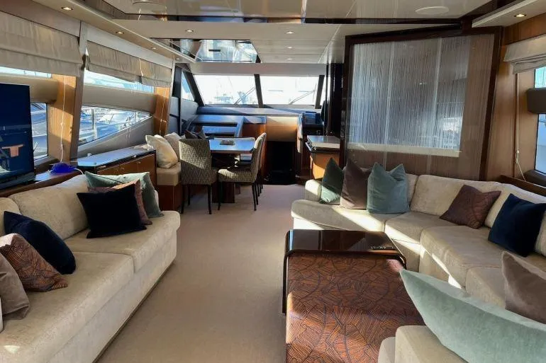  Yacht Photos Pics Luxurious interior of a 2016 Princess 72 Flybridge Motor Yacht with elegant seating and dining area.