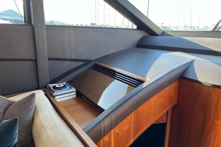  Yacht Photos Pics Interior of 2016 Princess 72 Flybridge Motor Yacht with sleek wood finish and cozy seating.