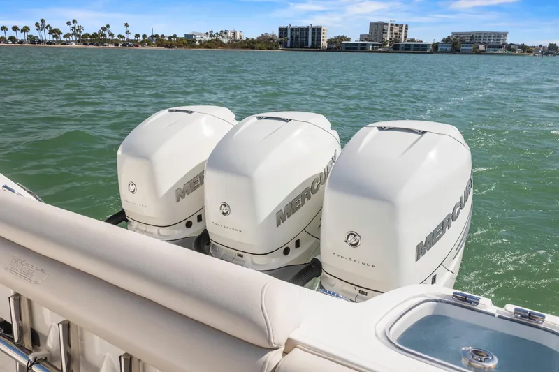  Yacht Photos Pics 2017 Boston Whaler 350 Outrage with triple Mercury outboard engines on water.