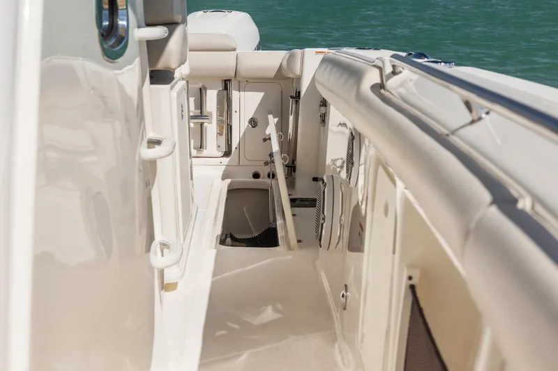  Yacht Photos Pics 2017 Boston Whaler 350 Outrage interior view, showcasing sleek design and spacious layout.