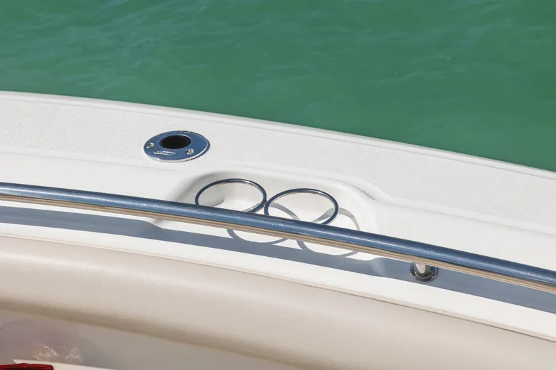  Yacht Photos Pics 2017 Boston Whaler 350 Outrage boat detail with cup holders and railing.