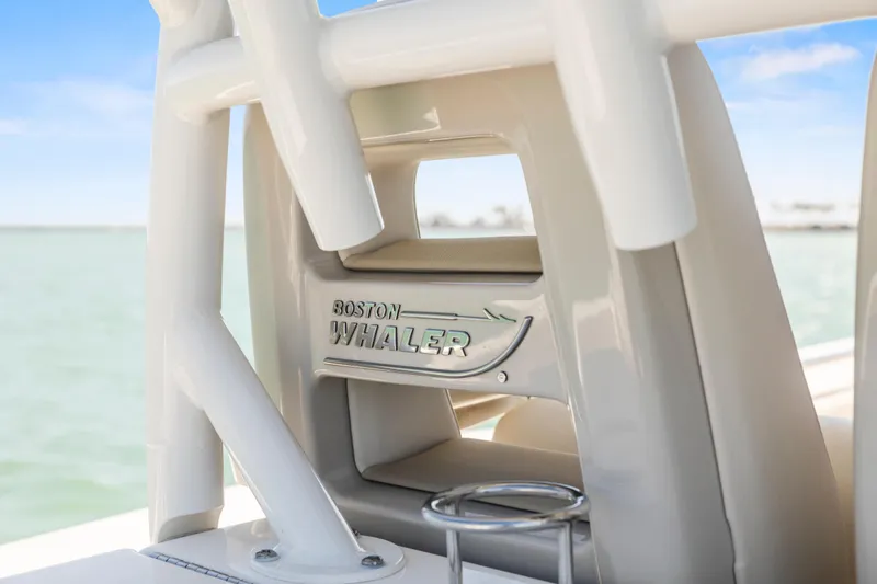  Yacht Photos Pics 2017 Boston Whaler 350 Outrage boat detail with logo, ocean background.