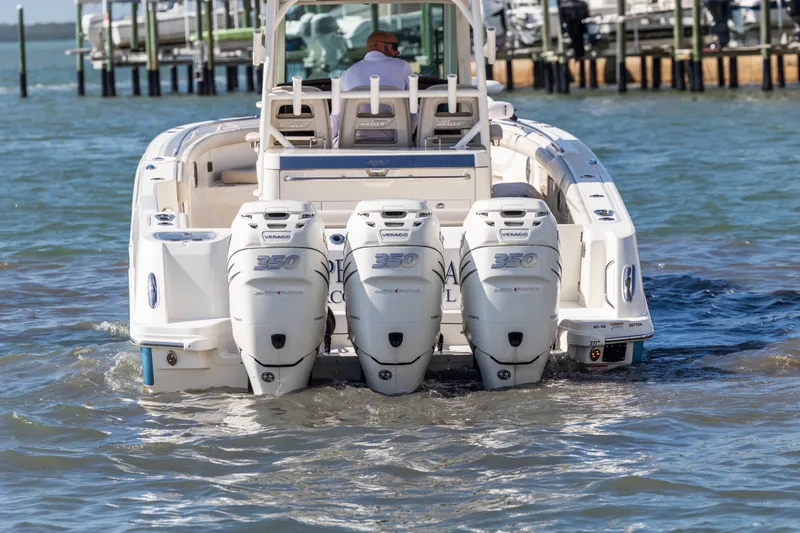  Yacht Photos Pics 2017 Boston Whaler 350 Outrage with triple Mercury Verado engines on water.