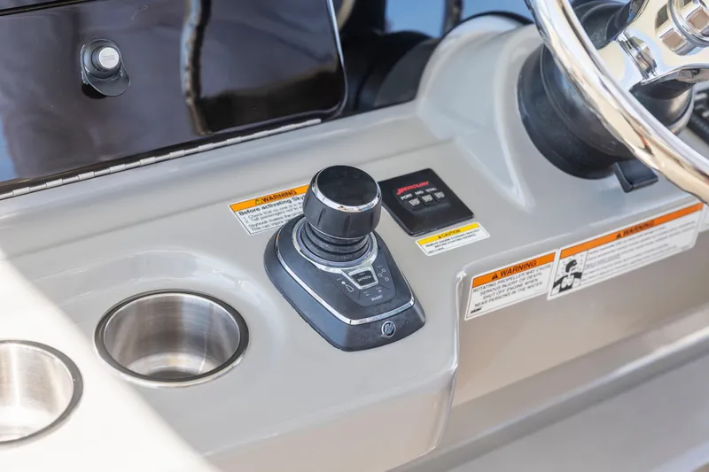  Yacht Photos Pics Control panel of 2017 Boston Whaler 350 Outrage with joystick and cup holder.