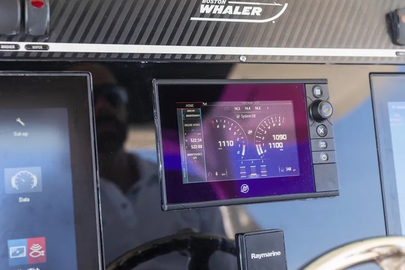  Yacht Photos Pics Dashboard of a 2017 Boston Whaler 350 Outrage with digital displays and controls.