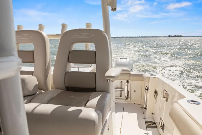  Yacht Photos Pics 2017 Boston Whaler 350 Outrage boat interior with ocean view.