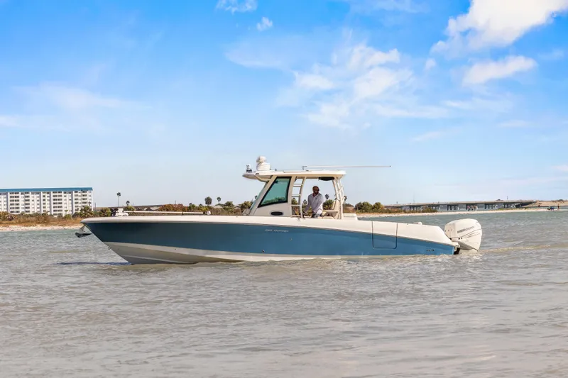  Yacht Photos Pics 2017 Boston Whaler 350 Outrage boat cruising on a sunny day.