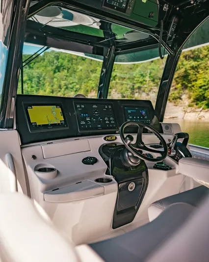  Yacht Photos Pics 2024 HCB 42 Lujo boat cockpit with advanced navigation systems and sleek design.