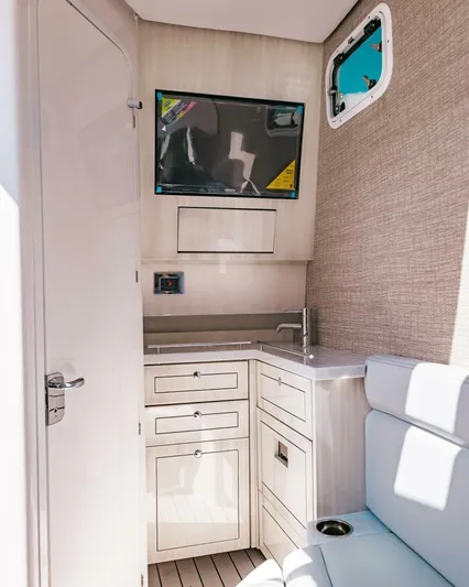  Yacht Photos Pics Interior of 2024 HCB 42 Lujo boat featuring modern cabinetry and seating.