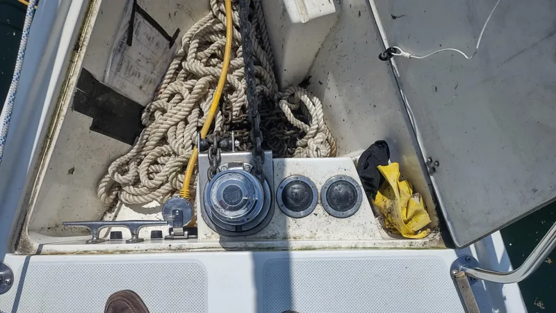 Spotted Drum II Yacht Photos Pics Anchor locker of 2004 Catalina 42 Mk II with ropes and winch.