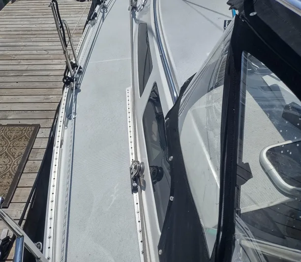 Spotted Drum II Yacht Photos Pics 2004 Catalina 42 Mk II sailboat docked, showing deck and cabin details.