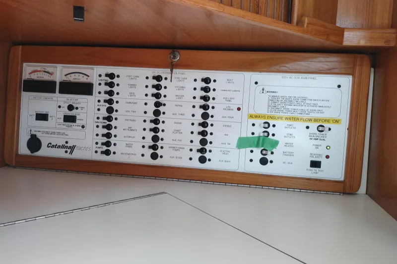 Spotted Drum II Yacht Photos Pics Electrical control panel of a 2004 Catalina 42 Mk II sailboat.