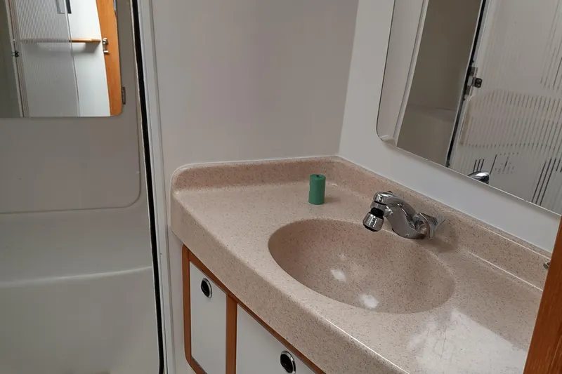 Spotted Drum II Yacht Photos Pics Bathroom sink area in a 2004 Catalina 42 Mk II yacht.