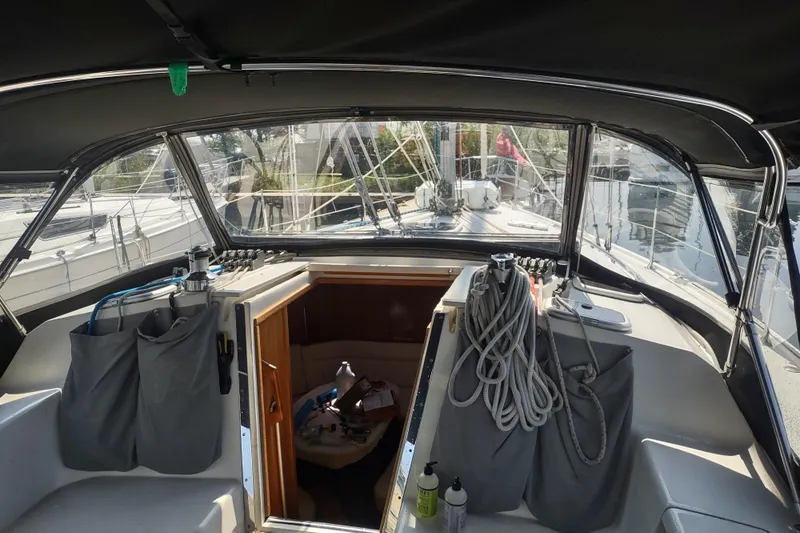 Spotted Drum II Yacht Photos Pics 2004 Catalina 42 Mk II sailboat cockpit with ropes and storage pockets.