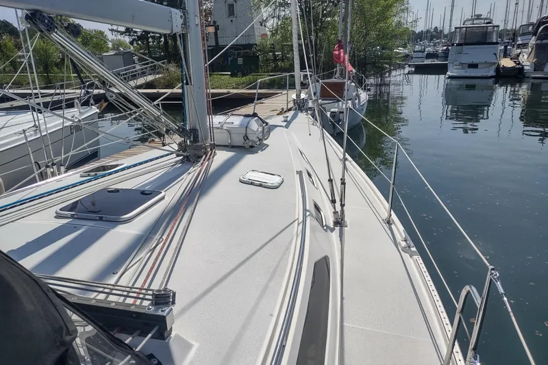 Spotted Drum II Yacht Photos Pics 2004 Catalina 42 Mk II sailboat docked at a marina, showcasing deck and rigging.