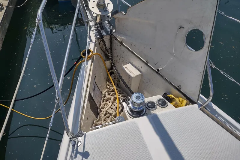 Spotted Drum II Yacht Photos Pics Bow of 2004 Catalina 42 Mk II sailboat with anchor chain and winch.