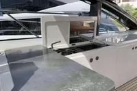 2016 Princess V58 Open yacht kitchen area with sleek countertops and modern fixtures.