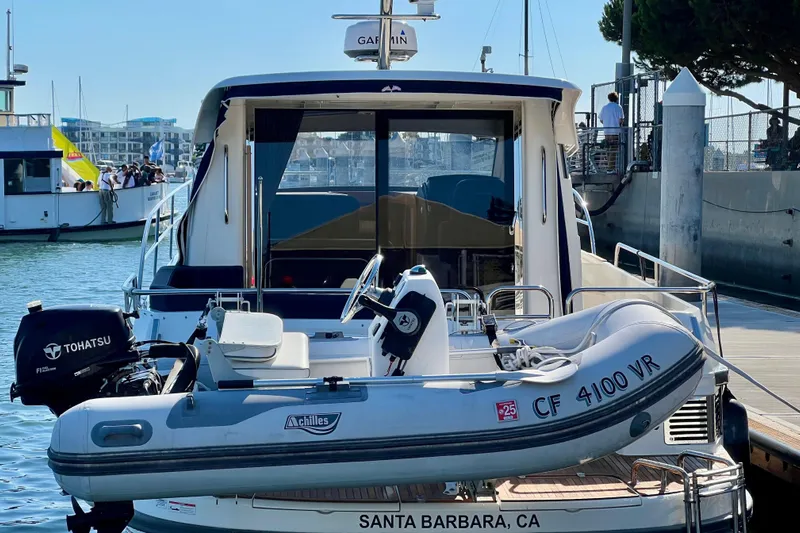 Kala Yacht Photos Pics 2018 Nimbus 365 Coupe docked with inflatable boat in Santa Barbara marina.