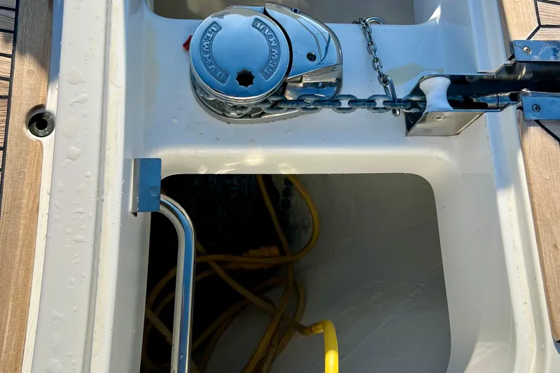 Kala Yacht Photos Pics Anchor chain compartment on 2018 Nimbus 365 Coupe boat, featuring Lewmar windlass.