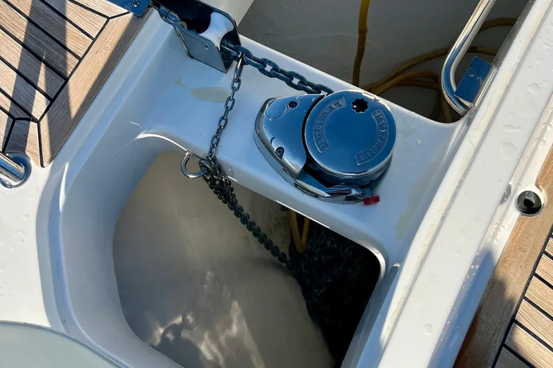 Kala Yacht Photos Pics Anchor chain mechanism on 2018 Nimbus 365 Coupe boat deck.