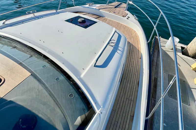 Kala Yacht Photos Pics 2018 Nimbus 365 Coupe yacht deck with sleek design and wooden flooring.