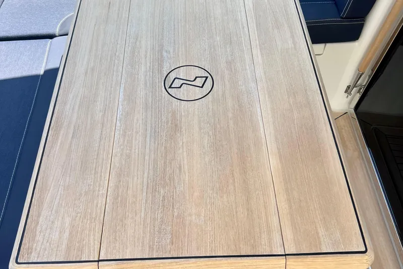 Kala Yacht Photos Pics Wooden table on 2018 Nimbus 365 Coupe boat with logo engraving.