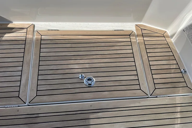 Kala Yacht Photos Pics Teak deck of 2018 Nimbus 365 Coupe boat, featuring sleek wood paneling.