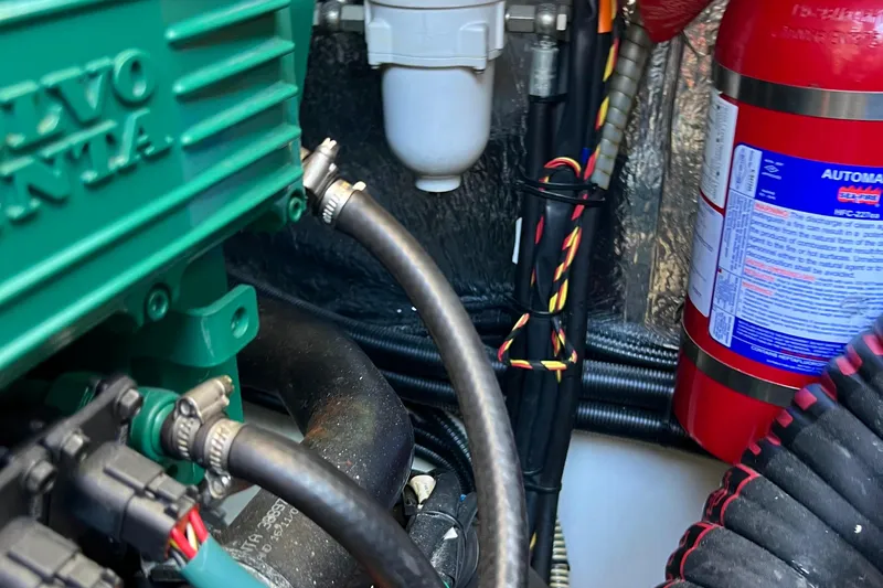 Kala Yacht Photos Pics Engine compartment of 2018 Nimbus 365 Coupe with Volvo Penta engine and fire extinguisher.