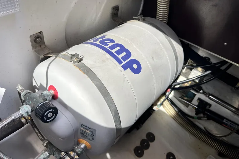 Kala Yacht Photos Pics Engine compartment of 2018 Nimbus 365 Coupe with a water heater system.