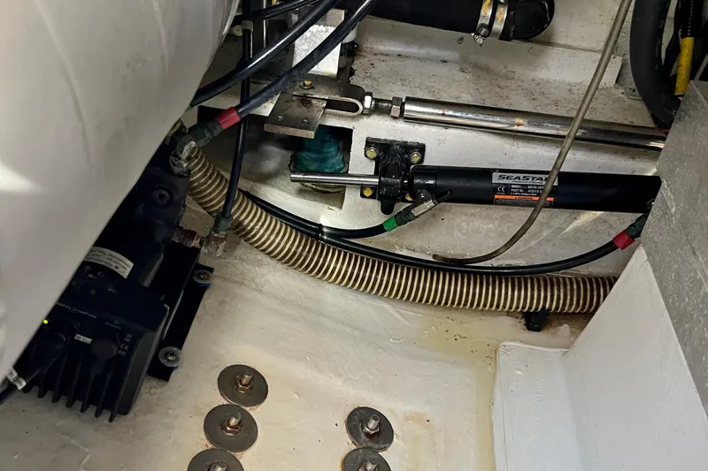 Kala Yacht Photos Pics Engine compartment of 2018 Nimbus 365 Coupe with hydraulic steering components.