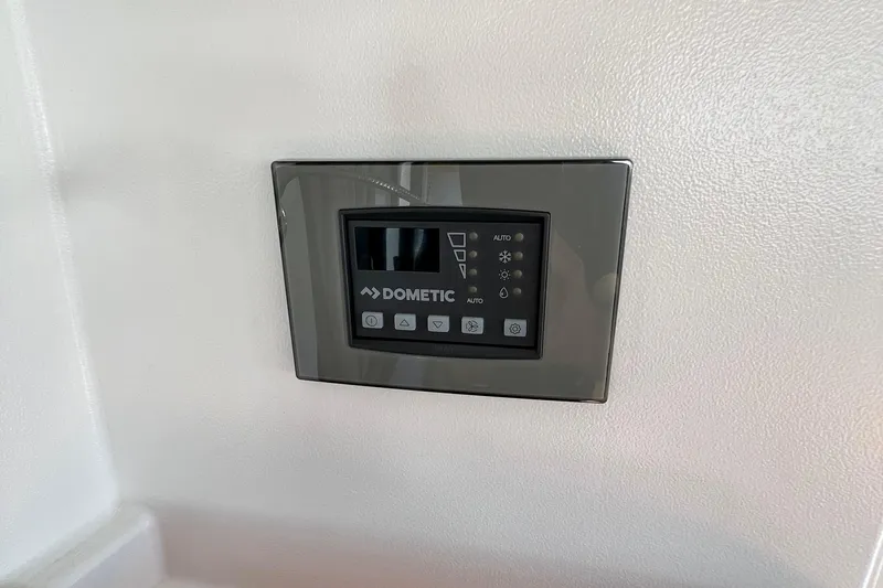 Kala Yacht Photos Pics Dometic control panel on 2018 Nimbus 365 Coupe boat interior wall.
